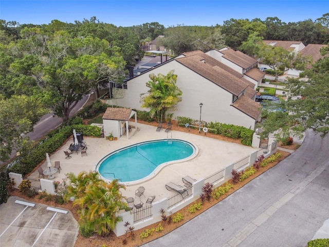 view of swimming pool with a patio area