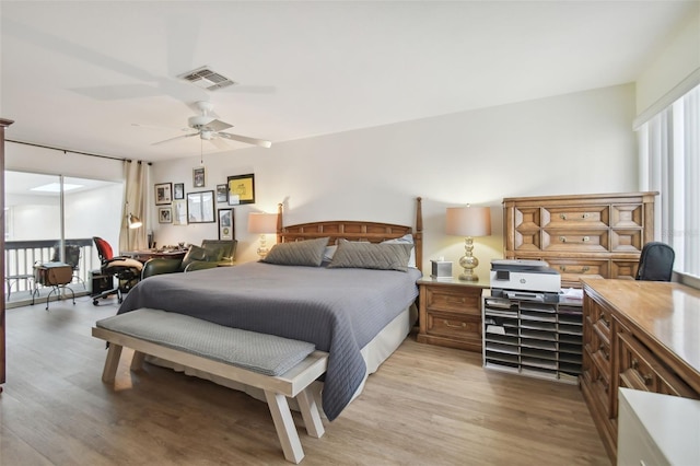 bedroom featuring light hardwood / wood-style flooring and ceiling fan