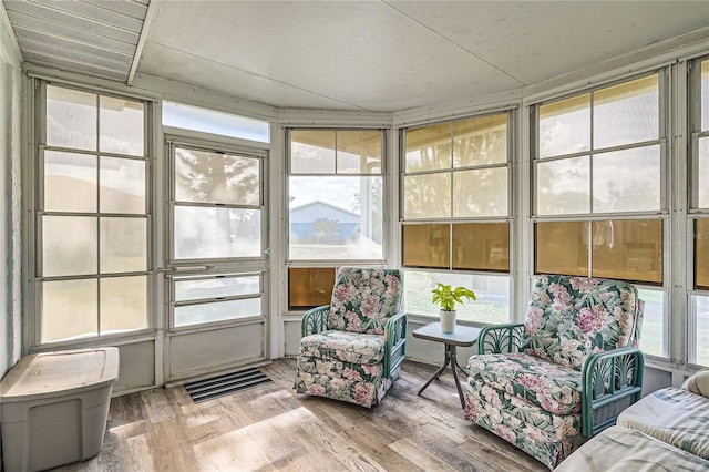 sunroom with plenty of natural light