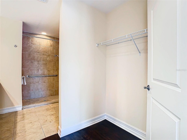 walk in closet featuring tile patterned floors