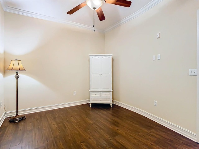 unfurnished room with ceiling fan, dark hardwood / wood-style floors, and ornamental molding