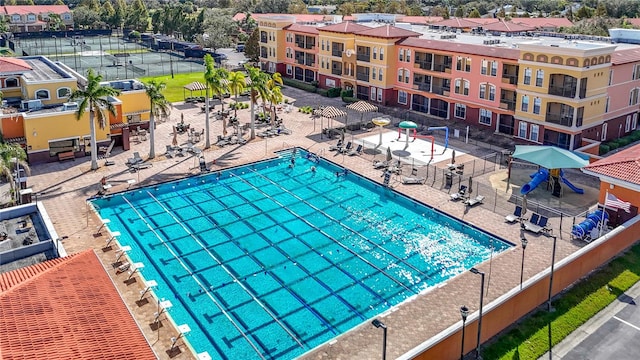 view of pool featuring a patio