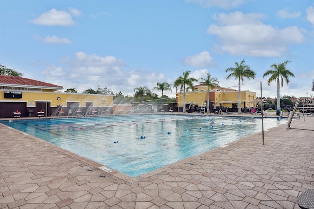 view of swimming pool featuring a patio