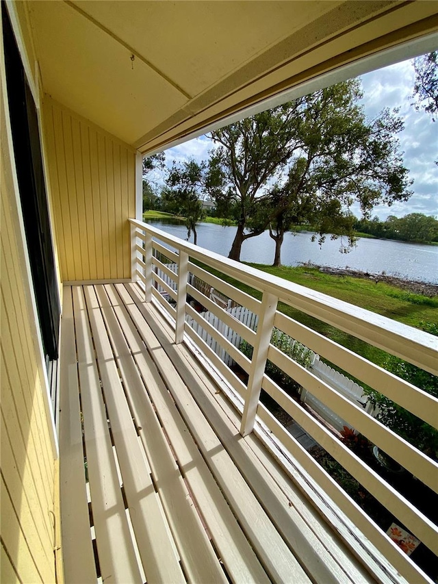 balcony featuring a water view