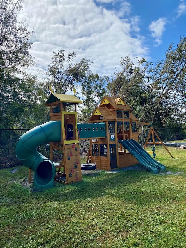 view of playground with a yard