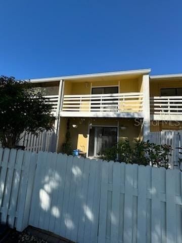 exterior space featuring a balcony