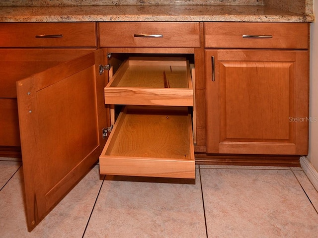 room details featuring light stone counters