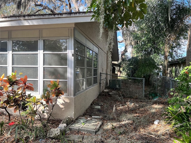 view of home's exterior featuring central AC