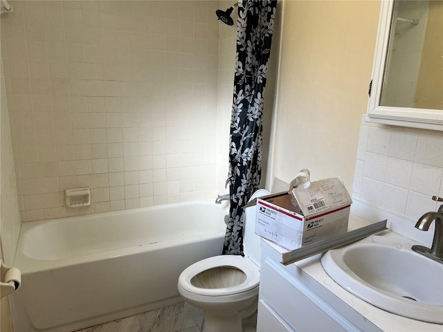 full bathroom featuring toilet, tile walls, decorative backsplash, vanity, and shower / bath combination with curtain