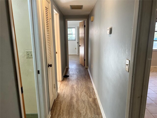 hall featuring light hardwood / wood-style floors