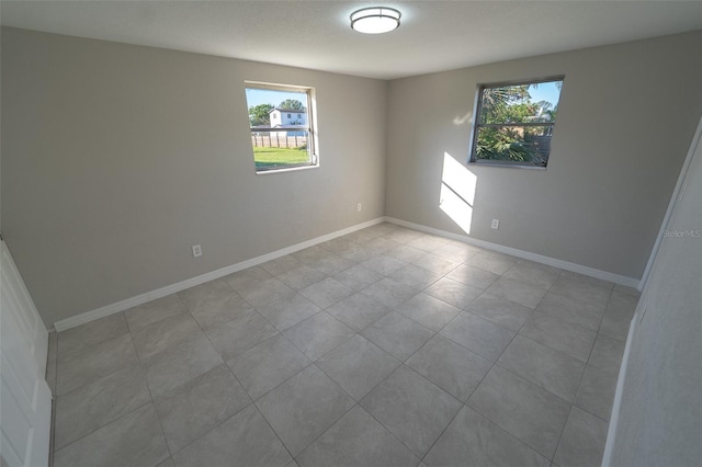 view of tiled empty room