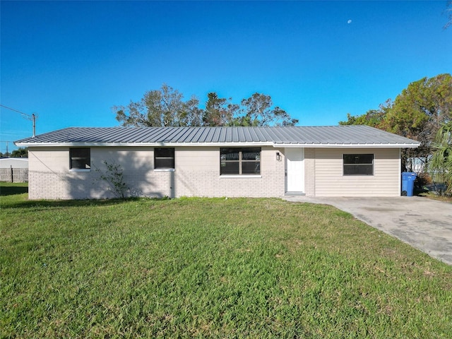 ranch-style house with a front lawn