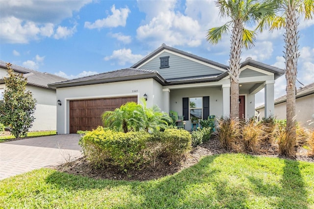 view of front of property with a garage