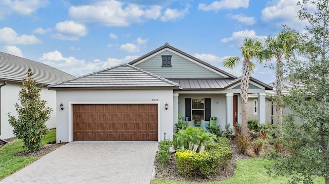 view of front of property with a garage