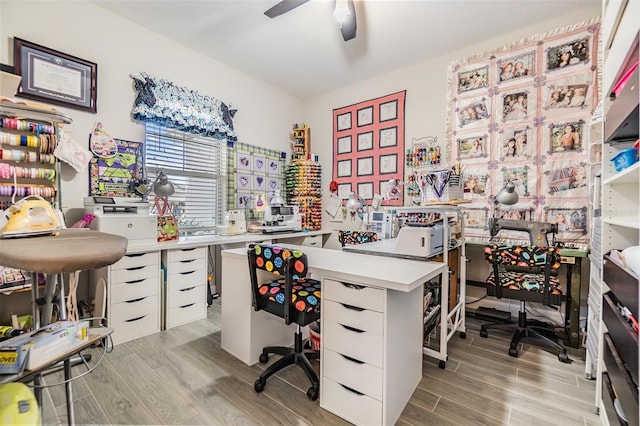 office featuring ceiling fan and light hardwood / wood-style floors