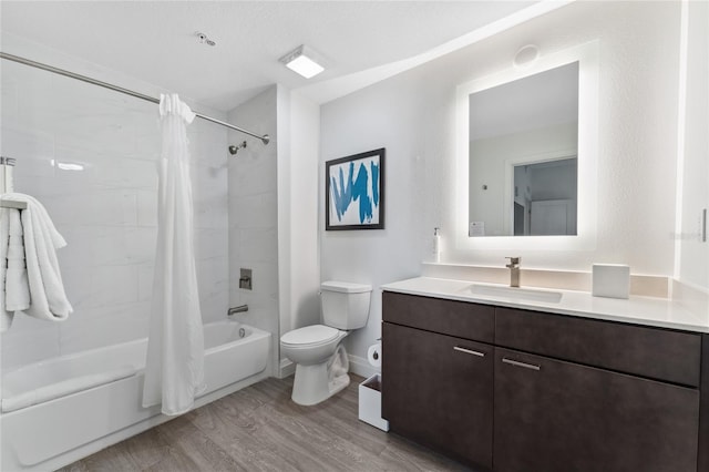 full bathroom with toilet, vanity, hardwood / wood-style flooring, and shower / bathtub combination with curtain