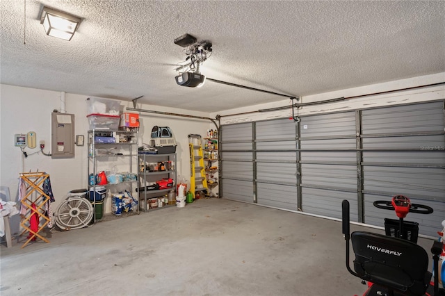 garage featuring electric panel and a garage door opener