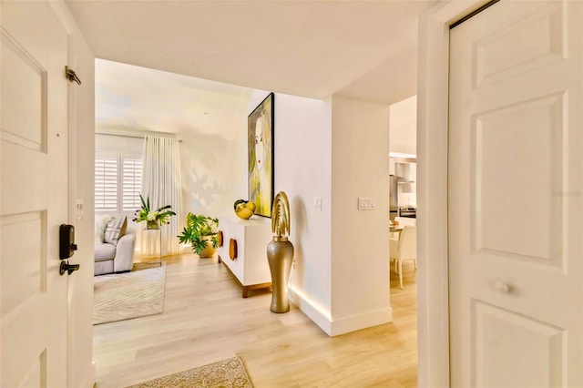 hallway featuring light hardwood / wood-style floors