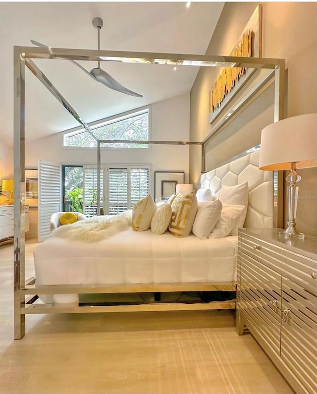 bedroom featuring lofted ceiling