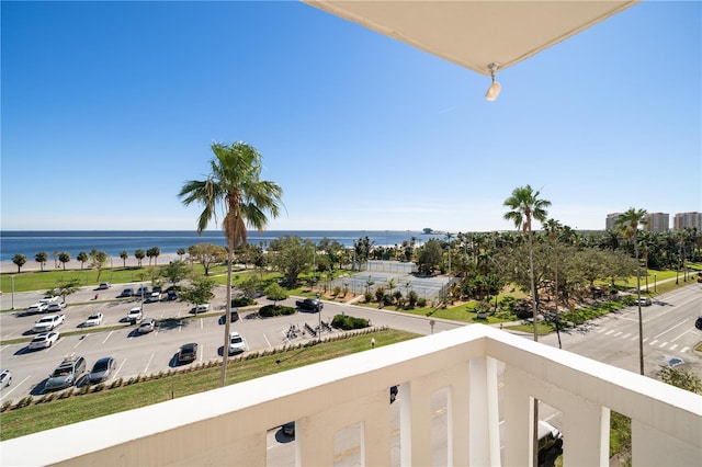 balcony featuring a water view