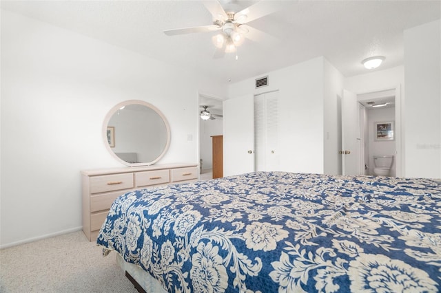 bedroom featuring carpet, ceiling fan, and a closet