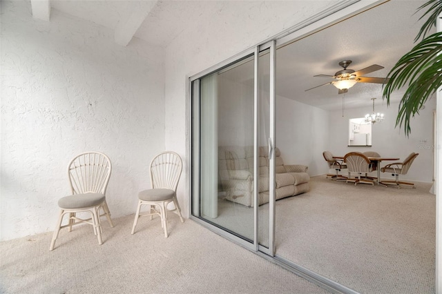 balcony featuring ceiling fan