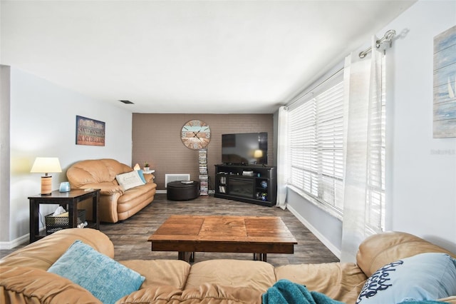 7511 Tyson Dr, Port Richey, FL 34668 - living area with wood finished floors and baseboards