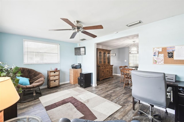 7511 Tyson Dr, Port Richey, FL 34668 - office with wood finished floors, a ceiling fan, a chandelier, and baseboards