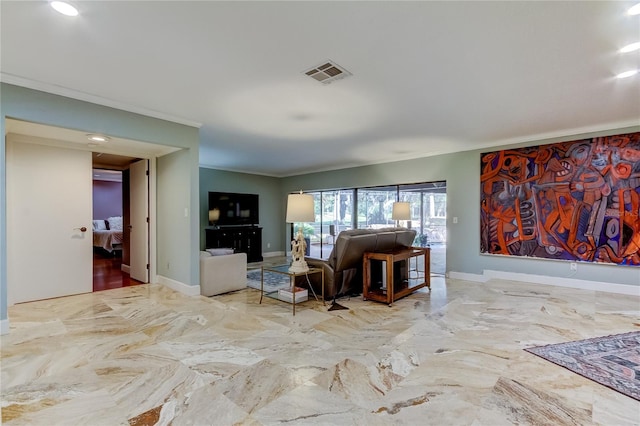 living room with ornamental molding