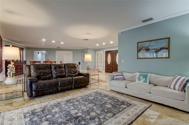 living room featuring crown molding