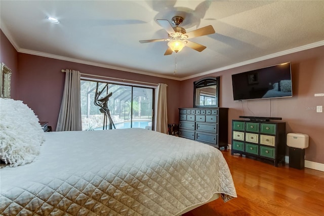 bedroom with access to exterior, hardwood / wood-style flooring, ornamental molding, and ceiling fan