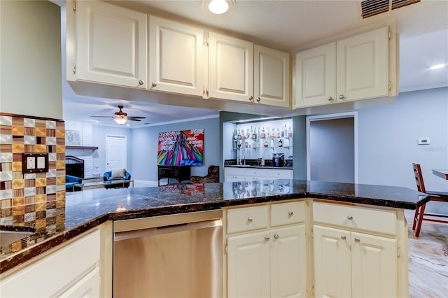 kitchen with dishwasher, kitchen peninsula, white cabinetry, and ceiling fan