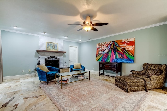 living room featuring crown molding, ceiling fan, and a brick fireplace