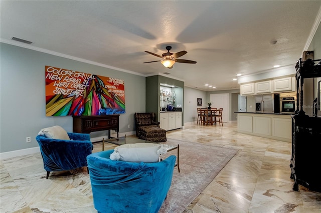 living room with a textured ceiling, ceiling fan, and crown molding