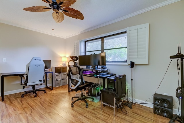 office area with light hardwood / wood-style floors, ceiling fan, and ornamental molding