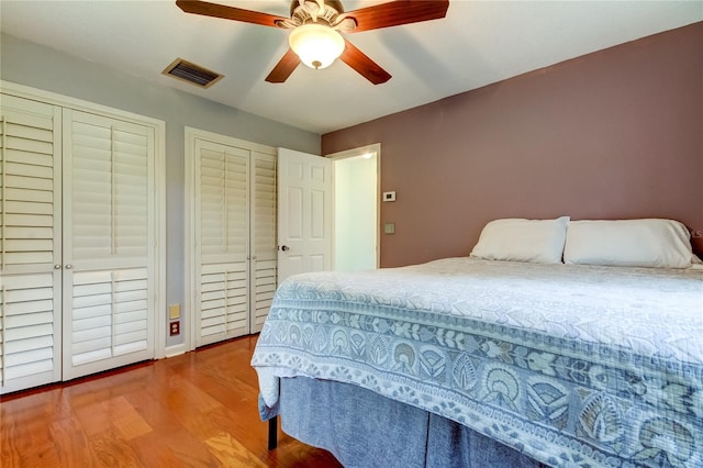 bedroom featuring hardwood / wood-style floors and ceiling fan