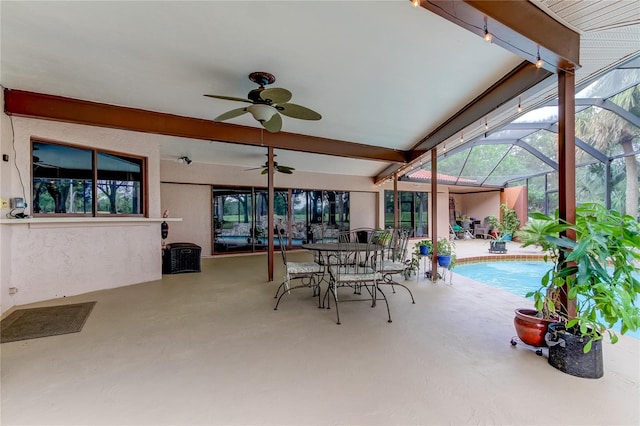 view of patio / terrace with glass enclosure and ceiling fan