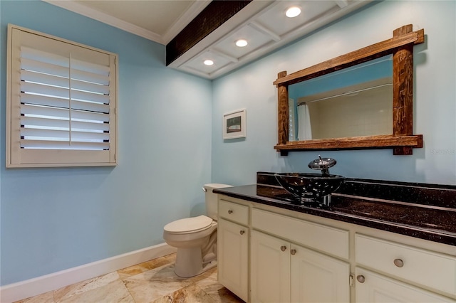 bathroom featuring a shower with curtain, vanity, toilet, and crown molding