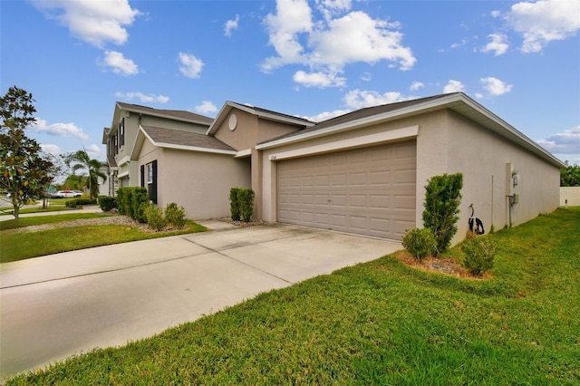 view of home's exterior with a garage and a lawn