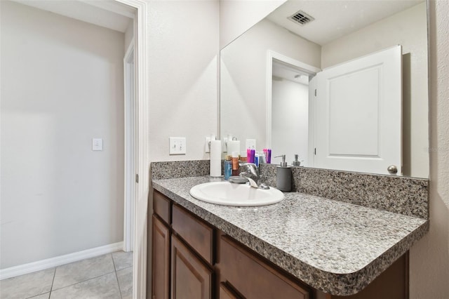 bathroom featuring vanity and tile patterned flooring