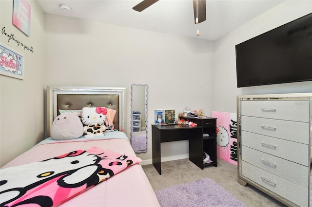 bedroom with light colored carpet and ceiling fan