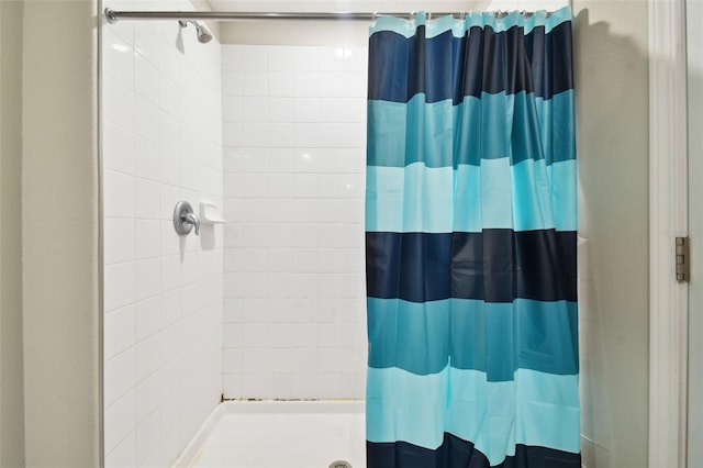 bathroom featuring walk in shower