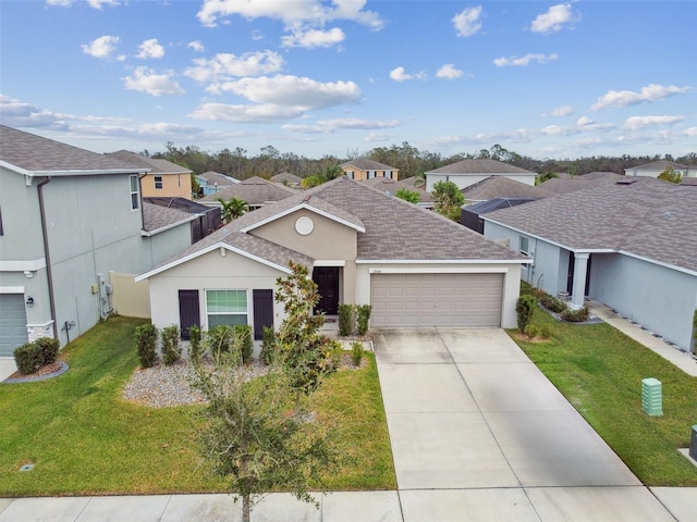 single story home featuring a garage and a front yard