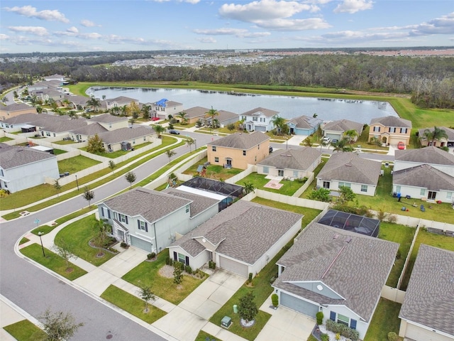 birds eye view of property featuring a water view