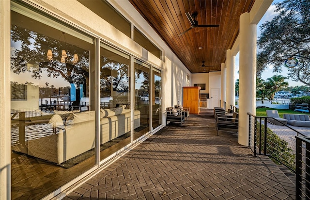 patio terrace at dusk with ceiling fan