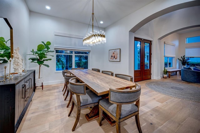 dining space with light wood-type flooring