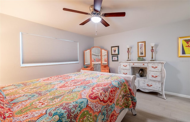 bedroom featuring ceiling fan and light wood-type flooring