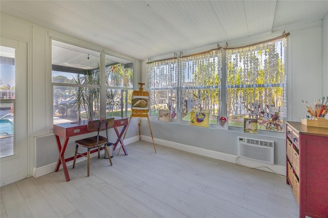 sunroom featuring a wall mounted air conditioner