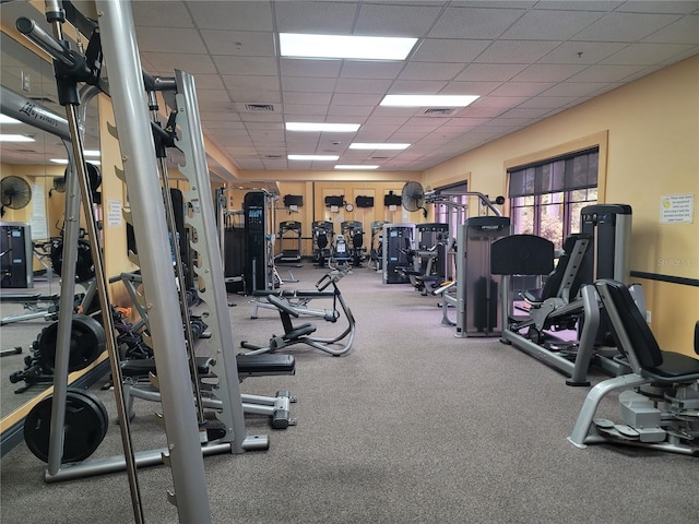 gym with a drop ceiling