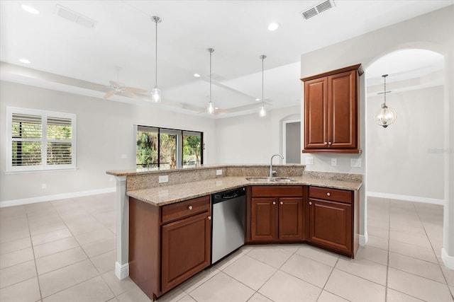 kitchen with light stone counters, dishwasher, light tile patterned floors, sink, and ceiling fan